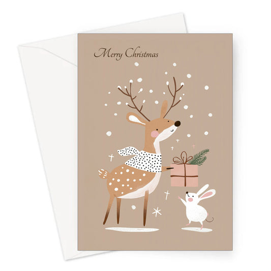 A5 Christmas card with a reindeer and mouse illustration, snowflakes, and Merry Christmas text, paired with a white envelope.